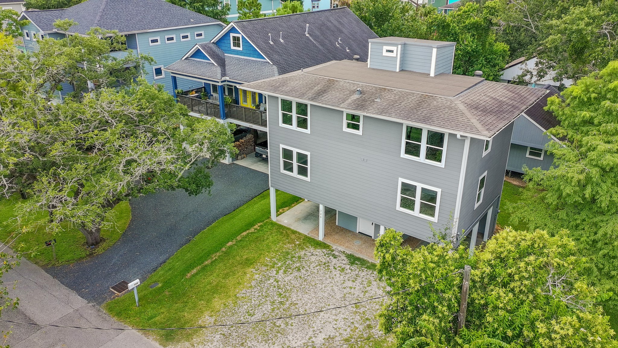 220 Pine Road Clear Lake Shores, TX 77565 - Photo 29 of 31 an aerial view of a house with a yard and a yard