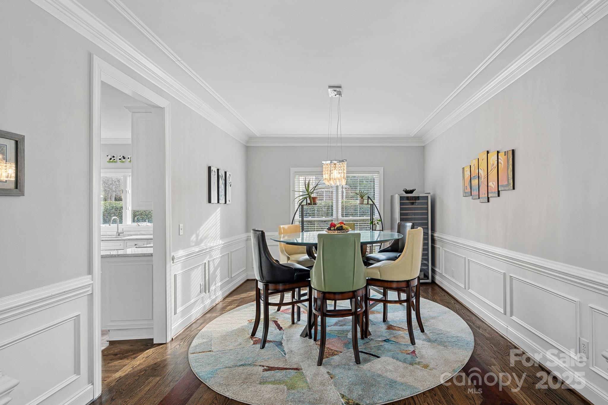 18334 Dembridge Drive Davidson, NC 28036 - Photo 14 of 35 a view of a dining room with furniture and wooden floor