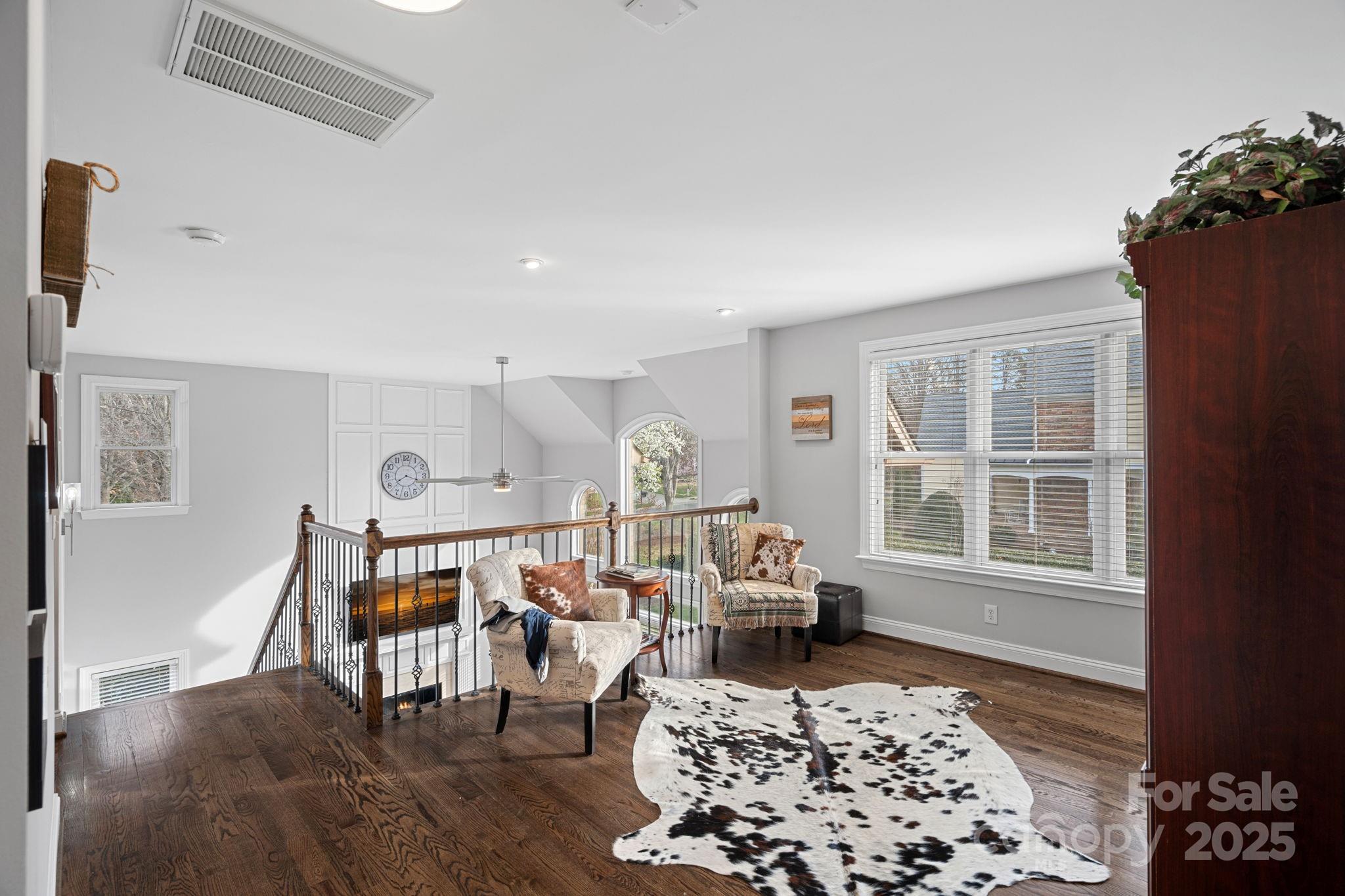 18334 Dembridge Drive Davidson, NC 28036 - Photo 21 of 35 a living room with furniture and a window