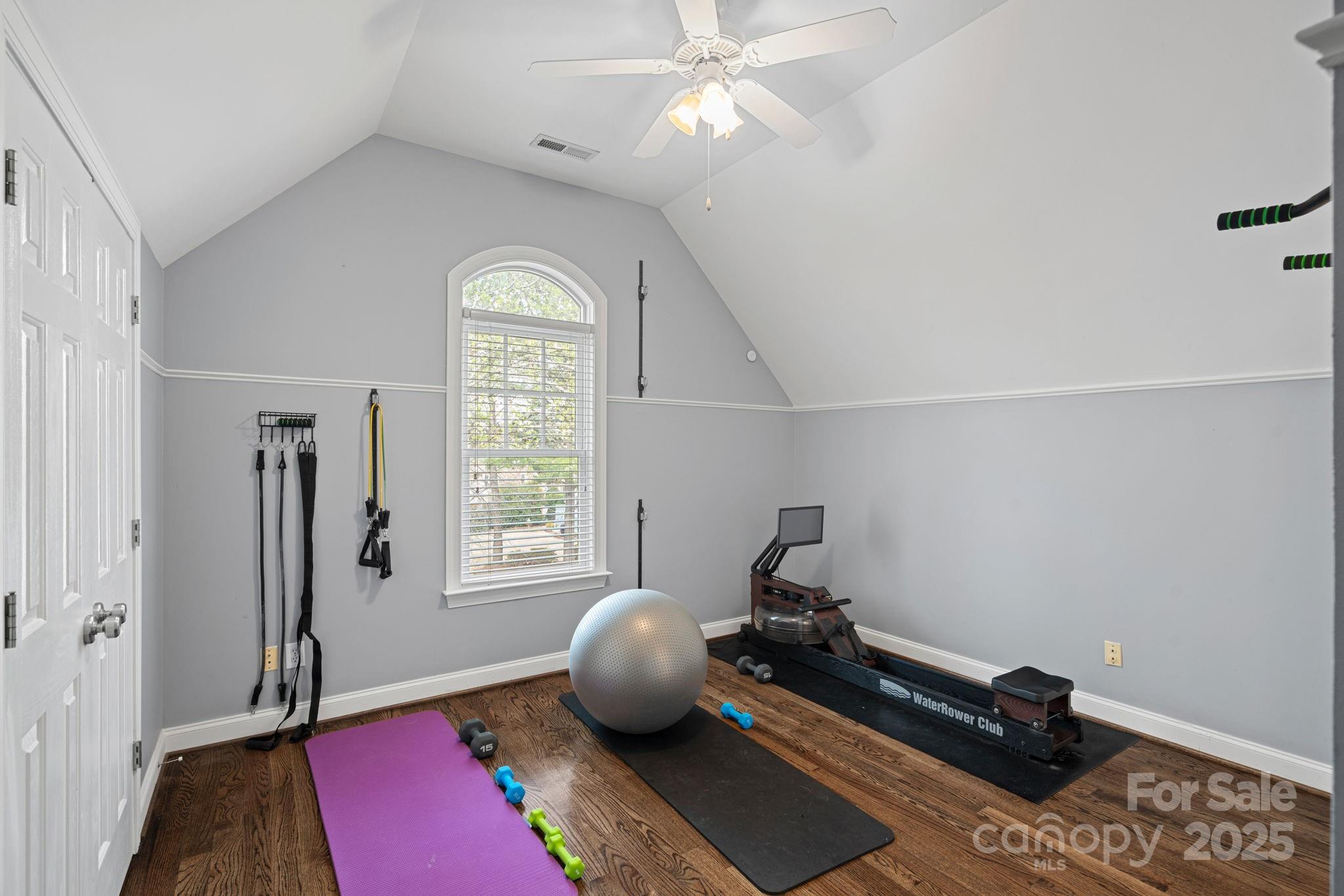 18334 Dembridge Drive Davidson, NC 28036 - Photo 26 of 35 a room with gym equipment