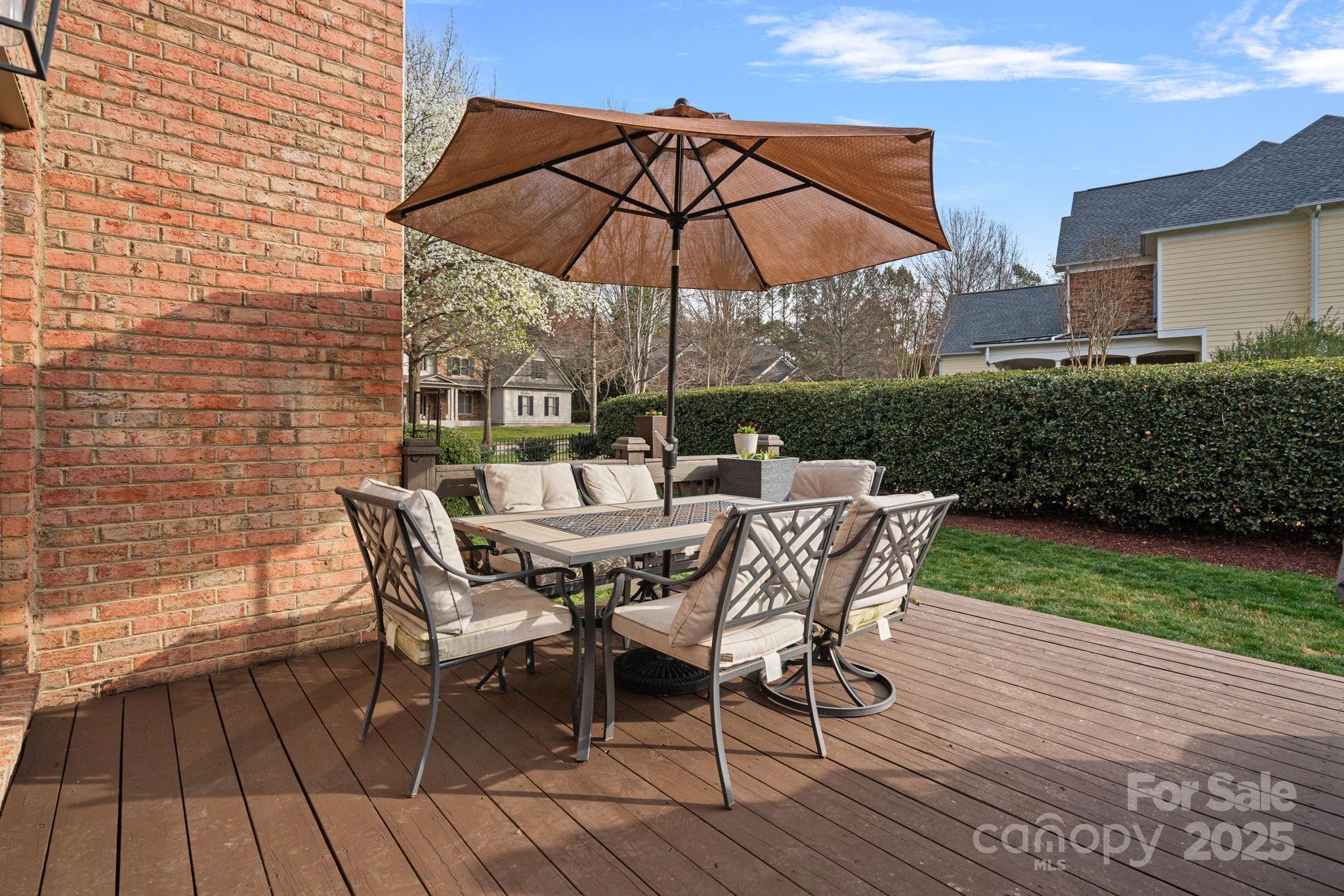 18334 Dembridge Drive Davidson, NC 28036 - Photo 27 of 35 a view of a patio with furniture and yard