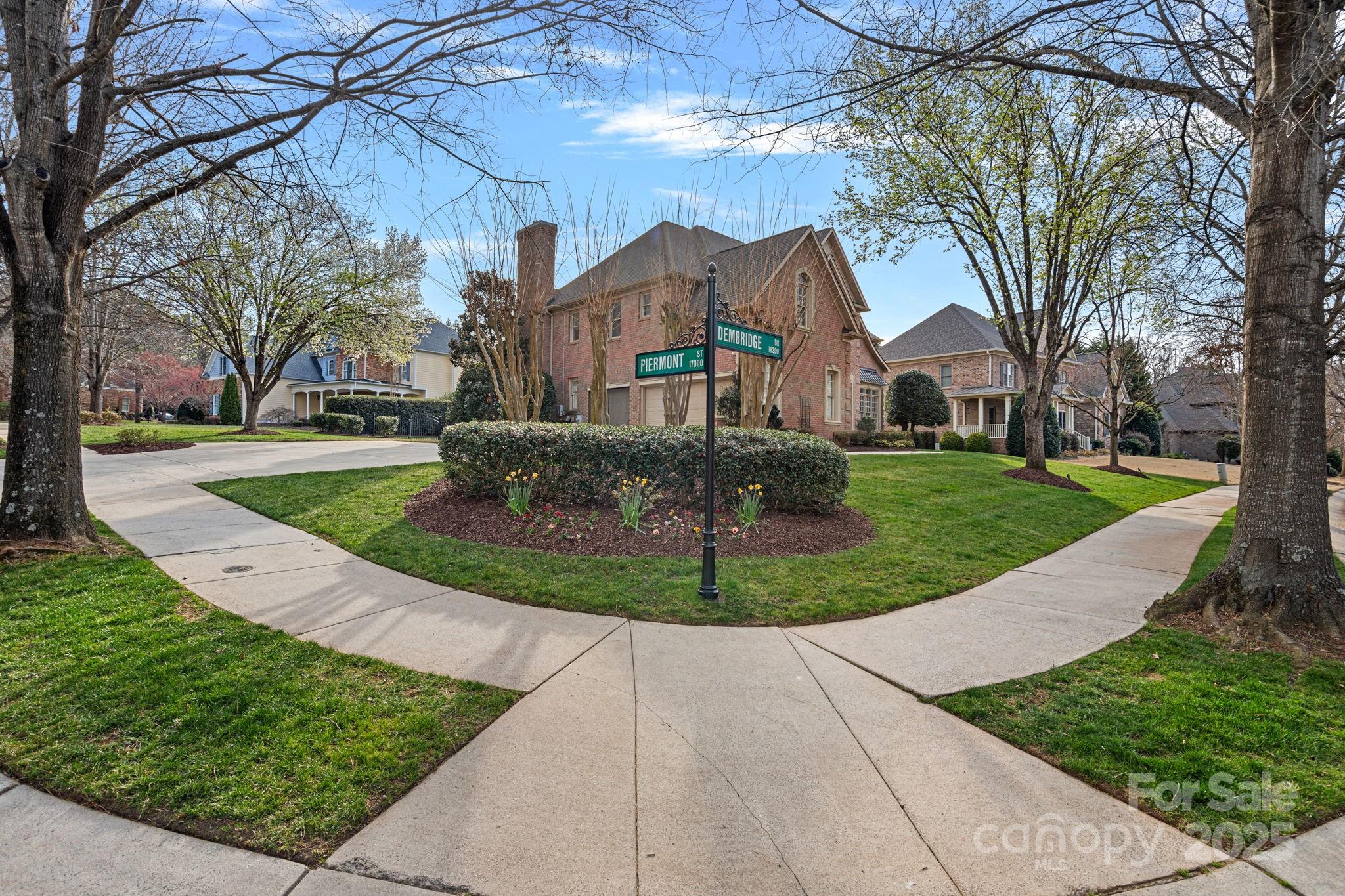 18334 Dembridge Drive Davidson, NC 28036 - Photo 33 of 35 a front view of a house with a yard
