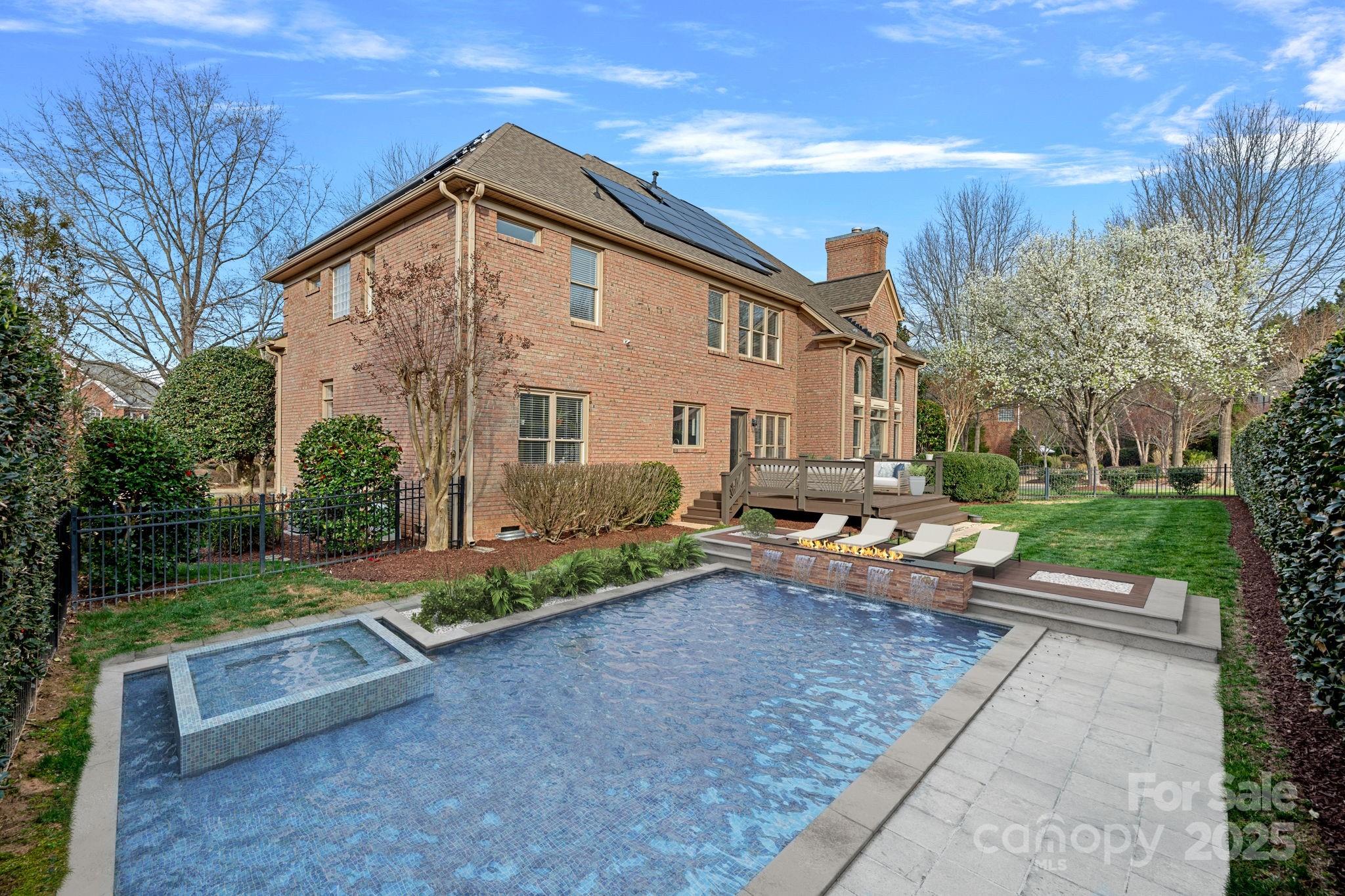 18334 Dembridge Drive Davidson, NC 28036 - Photo 35 of 35 a front view of a house with garden