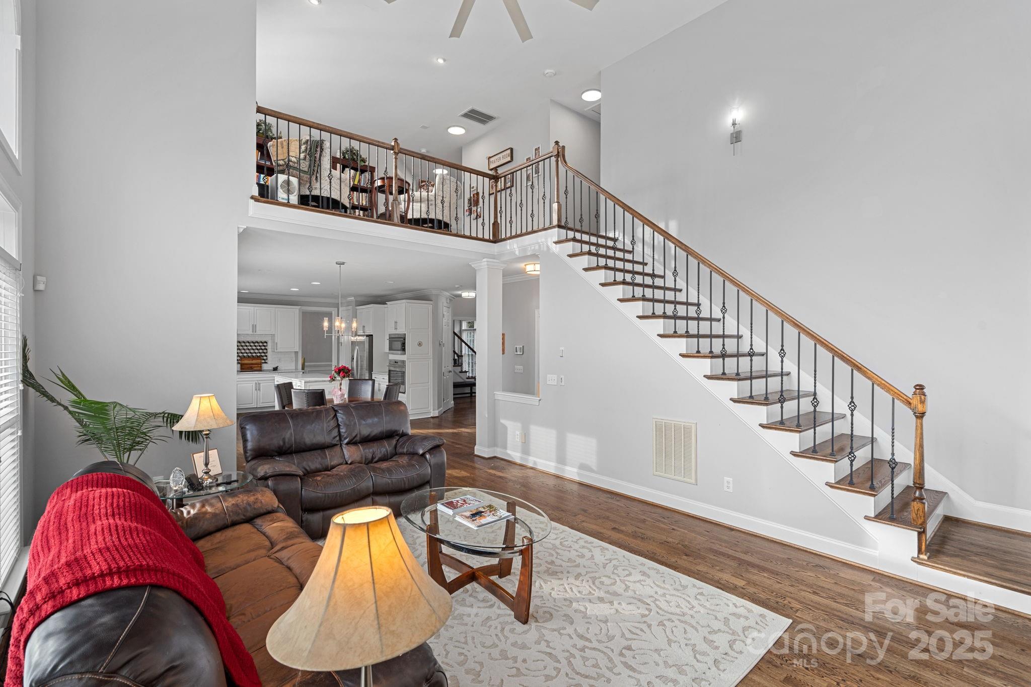18334 Dembridge Drive Davidson, NC 28036 - Photo 9 of 35 a living room with furniture and a rug