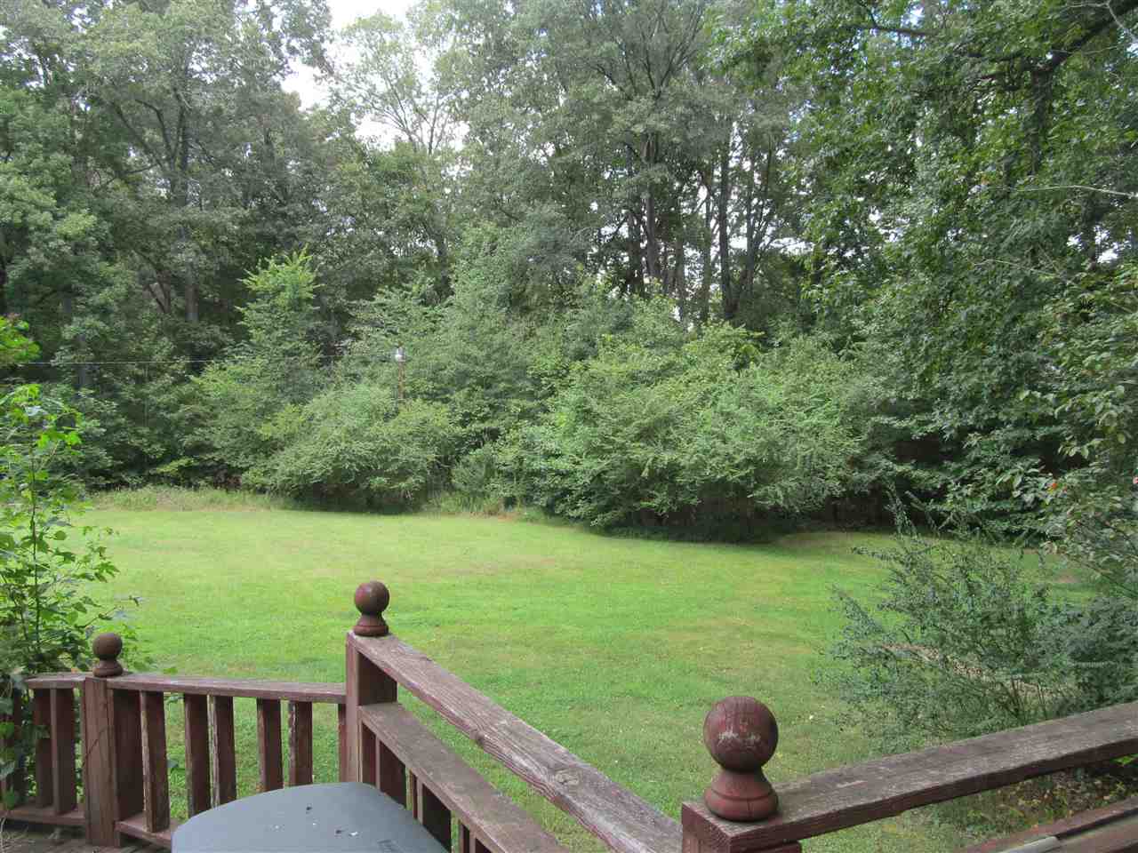 965 Walnut Bend Road Arlington, TN 38002 - Photo 22 of 25 In addition to the wooded area, there's plenty of room for garden, a playset or whatever you imagine.
