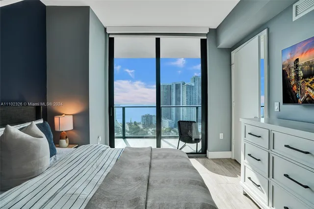 a bathroom with a double vanity sink and mirror