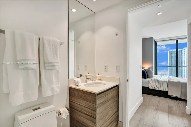 a bathroom with a bathtub and a sink