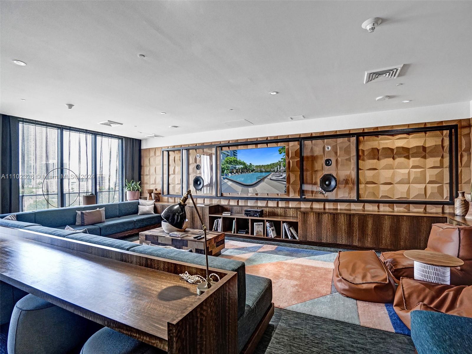 121 Northeast 34th Street, Unit 2906 Miami, FL 33137 - Photo 42 of 65 a living room with furniture pool table and a large window