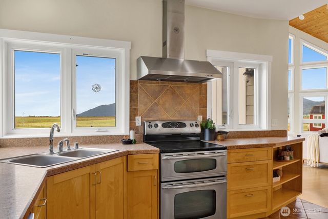 a view of hallway with washer and dryer