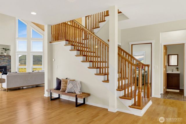 a utility room with sink dryer and washer