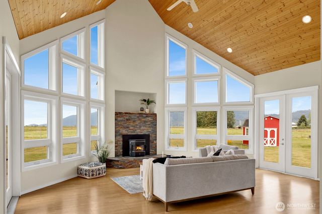 a kitchen with stainless steel appliances granite countertop a sink and a stove