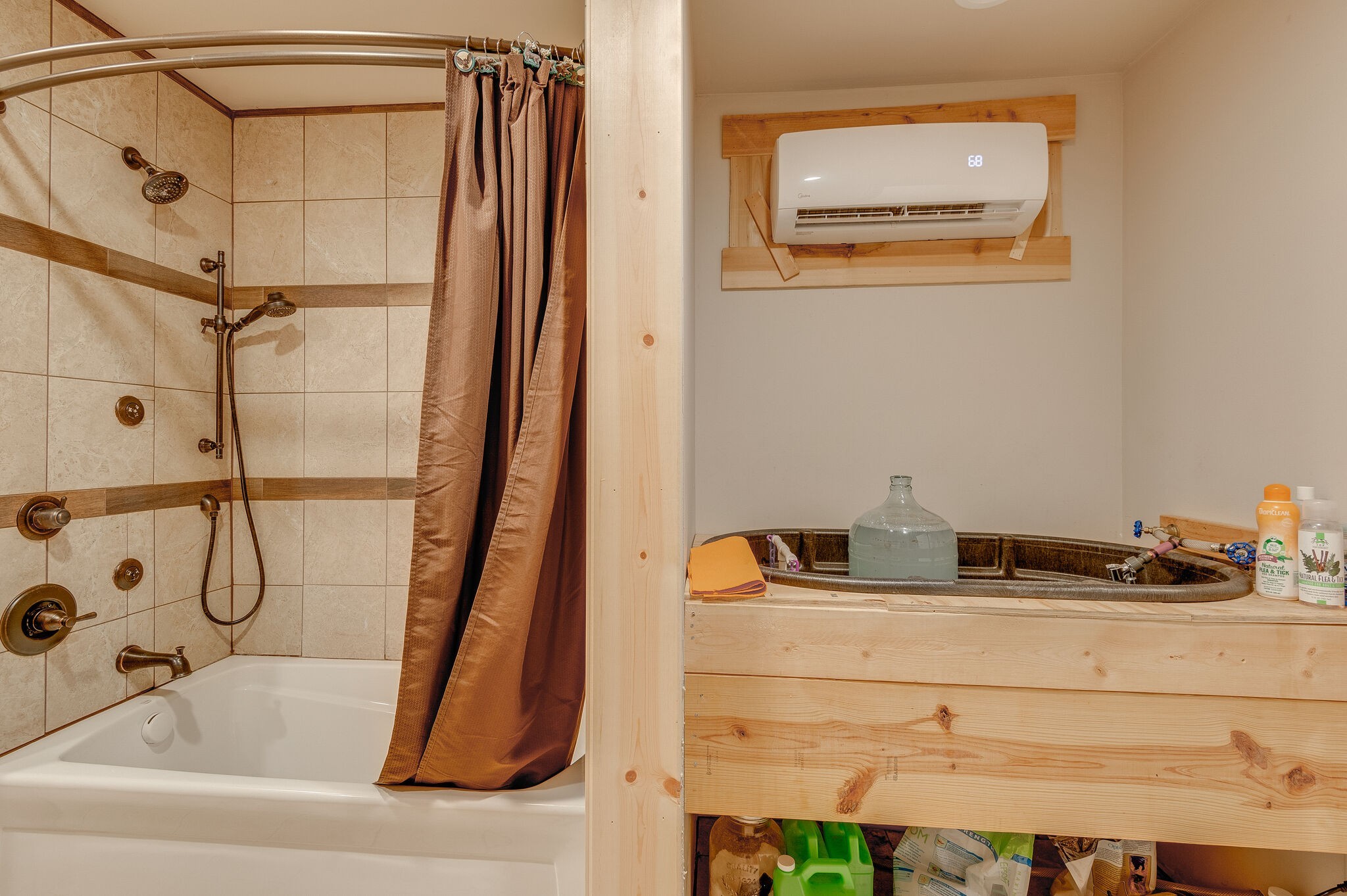 1372 Cliff Amos Road Spring Hill, TN 37174 - Photo 16 of 49 a bathroom with a bathtub and shower