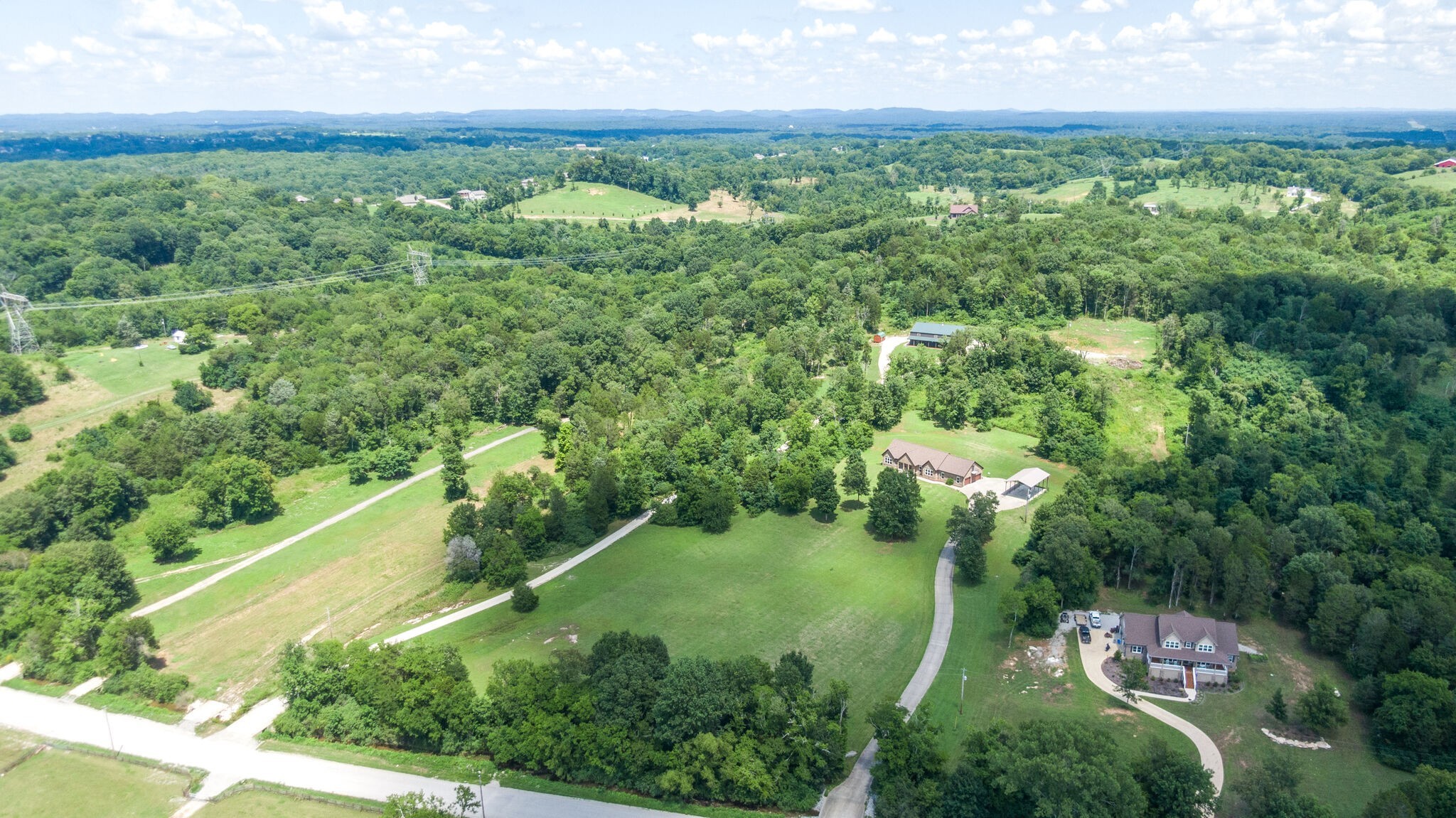 1372 Cliff Amos Road Spring Hill, TN 37174 - Photo 36 of 49 an aerial view of residential houses with outdoor space and trees