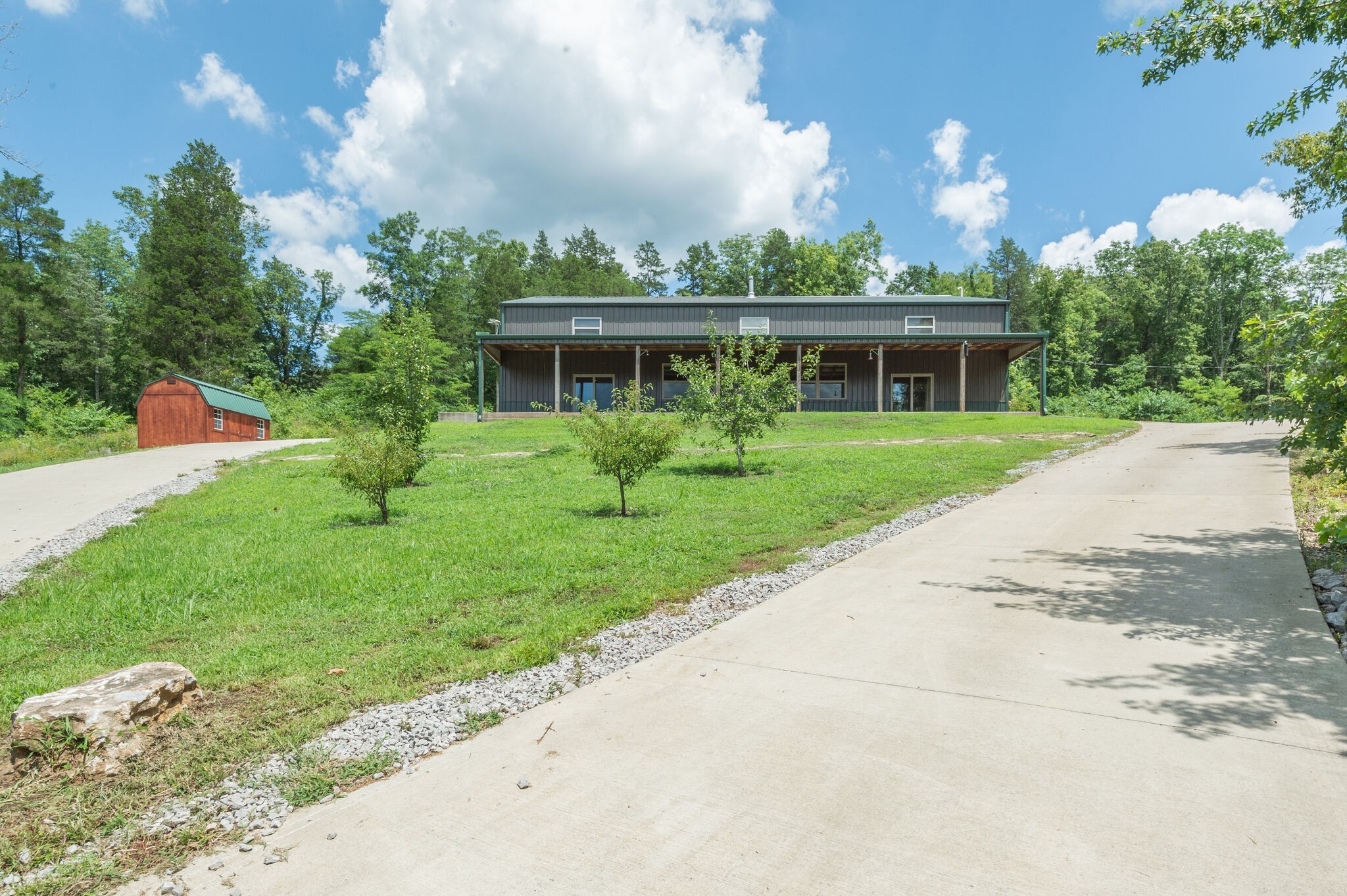 1372 Cliff Amos Road Spring Hill, TN 37174 - Photo 4 of 49 front view of a house with a yard