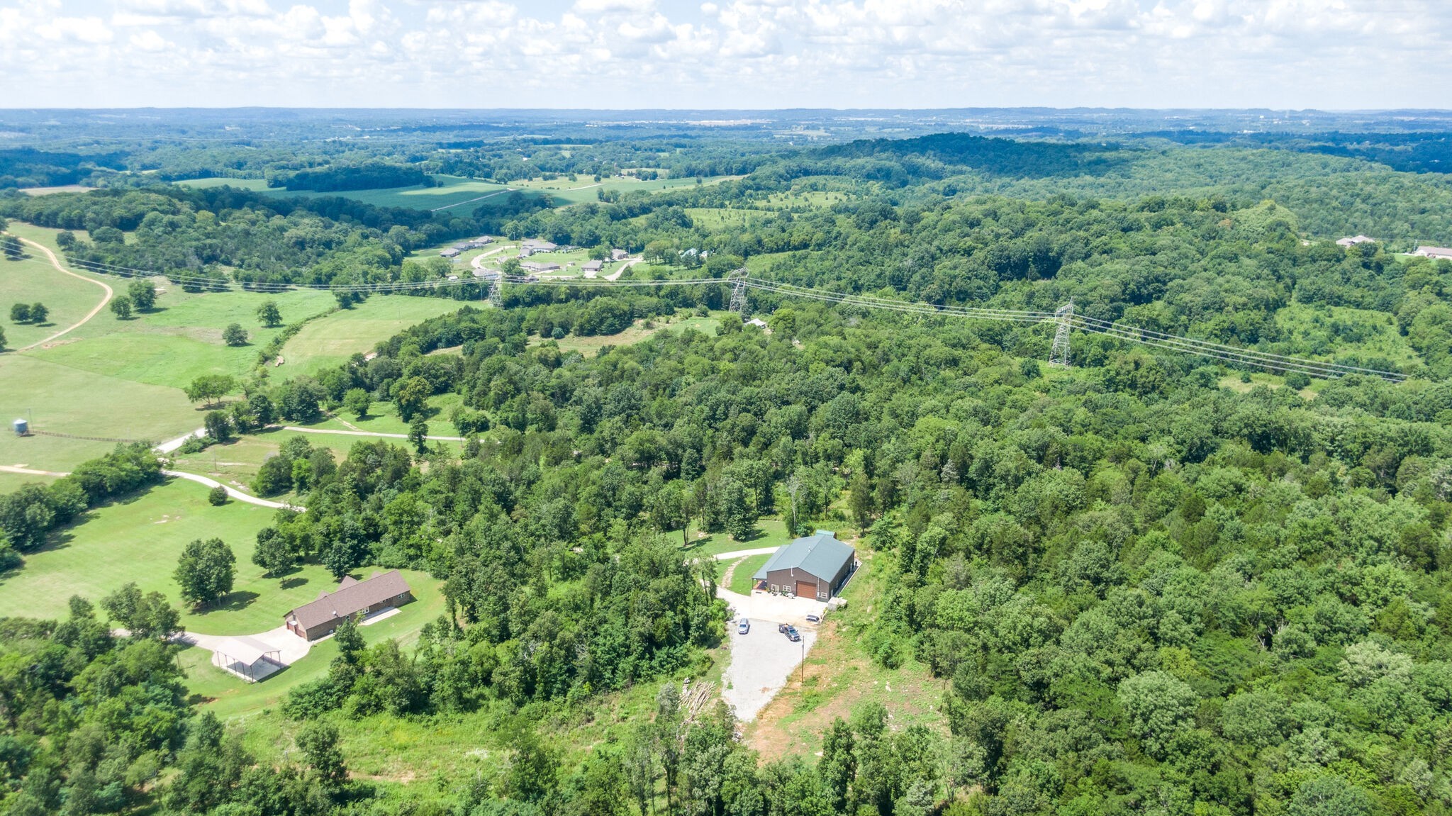 1372 Cliff Amos Road Spring Hill, TN 37174 - Photo 44 of 49 an aerial view of a house with a yard