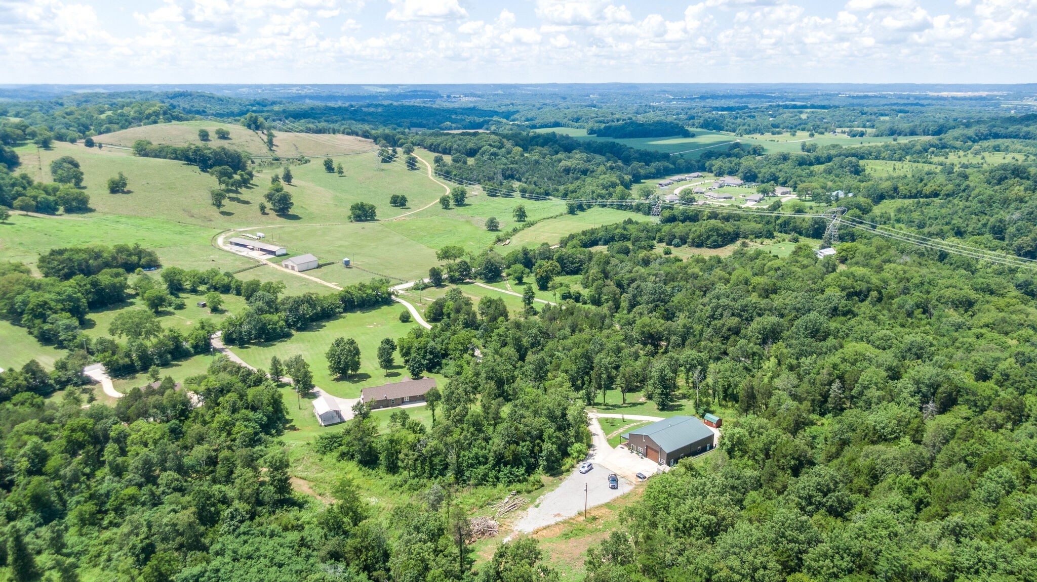 1372 Cliff Amos Road Spring Hill, TN 37174 - Photo 45 of 49 an aerial view of residential house with outdoor space and trees all around