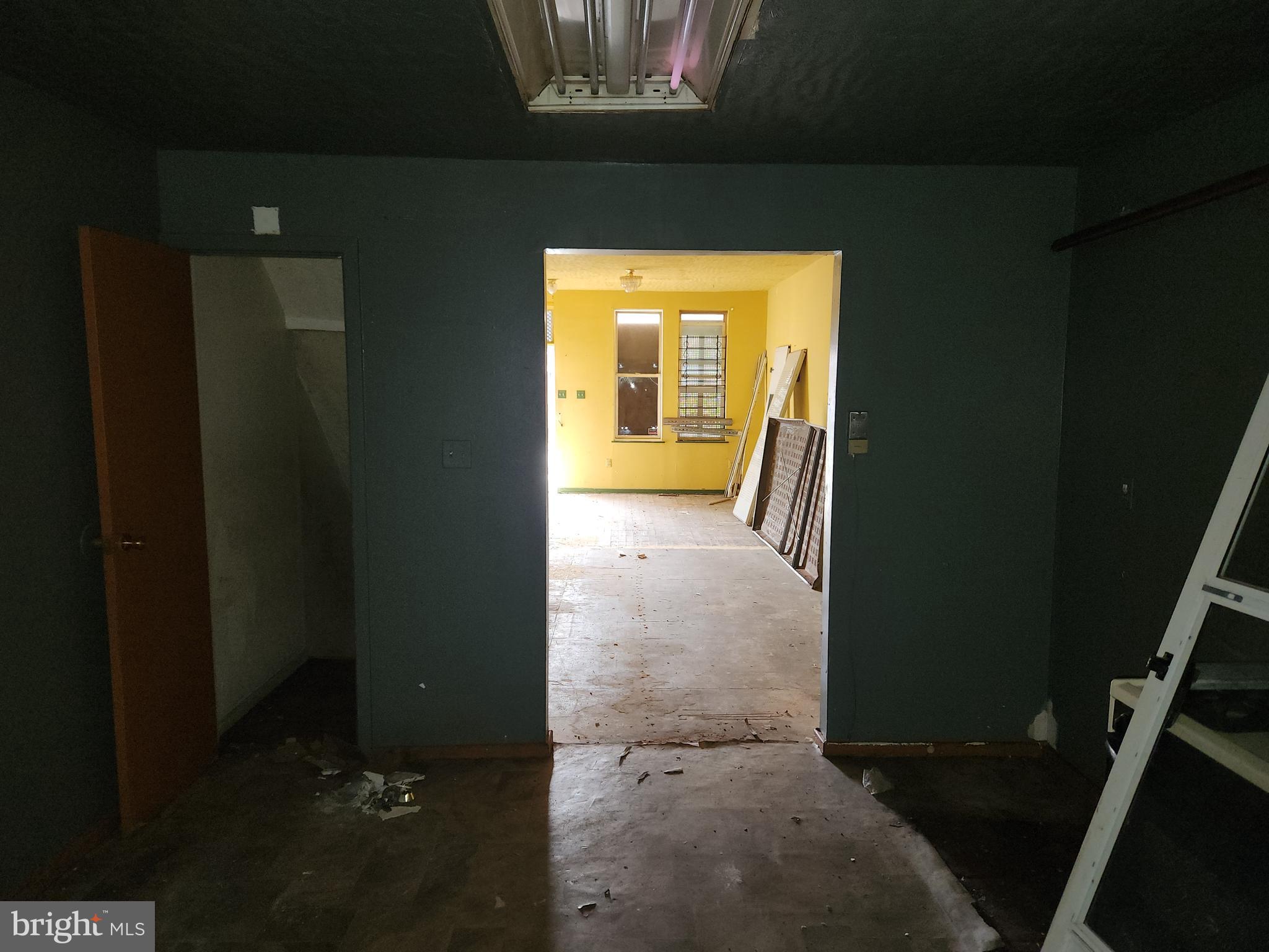 3424 West Belvedere Avenue Baltimore, MD 21215 - Photo 5 of 14 a view of hallway with wooden floor