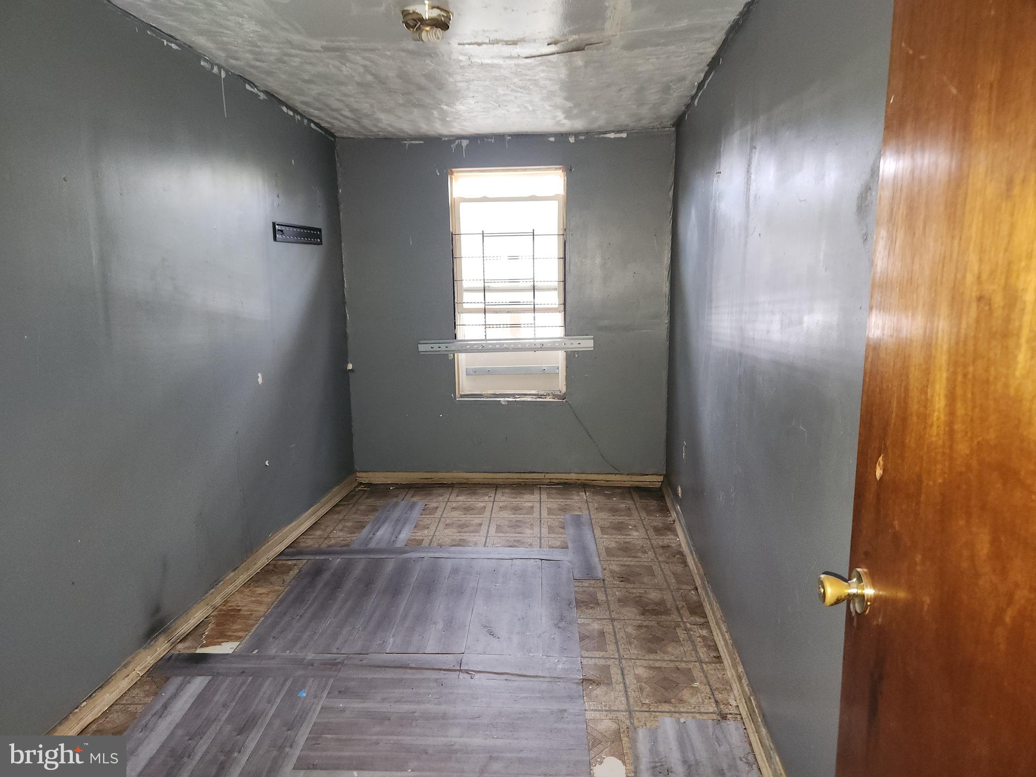 3424 West Belvedere Avenue Baltimore, MD 21215 - Photo 8 of 14 a view of hallway with window