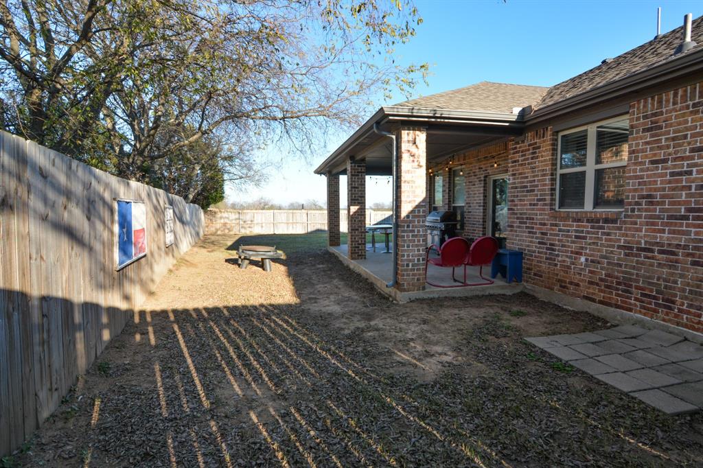 601 Mathew Street Grandview, TX 76050 - Photo 40 of 40 a view of a house with backyard
