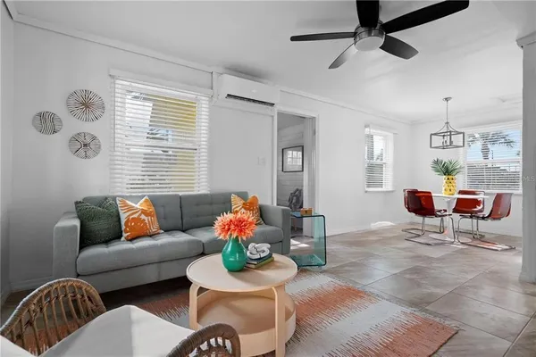 a kitchen with stainless steel appliances a sink a stove and cabinets