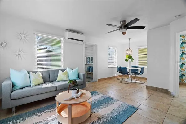 a kitchen with a sink cabinets and window