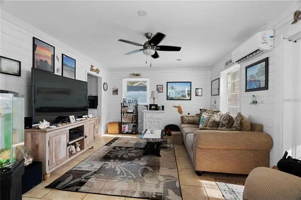 a living room with furniture and a window