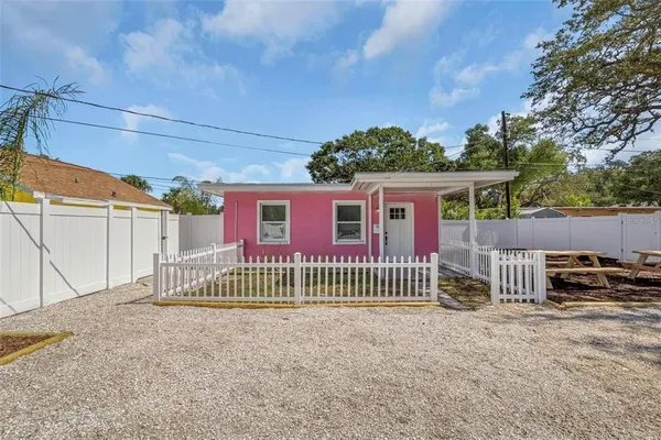 a view of a back yard of the house