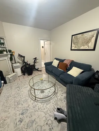 a living room with furniture and a couch