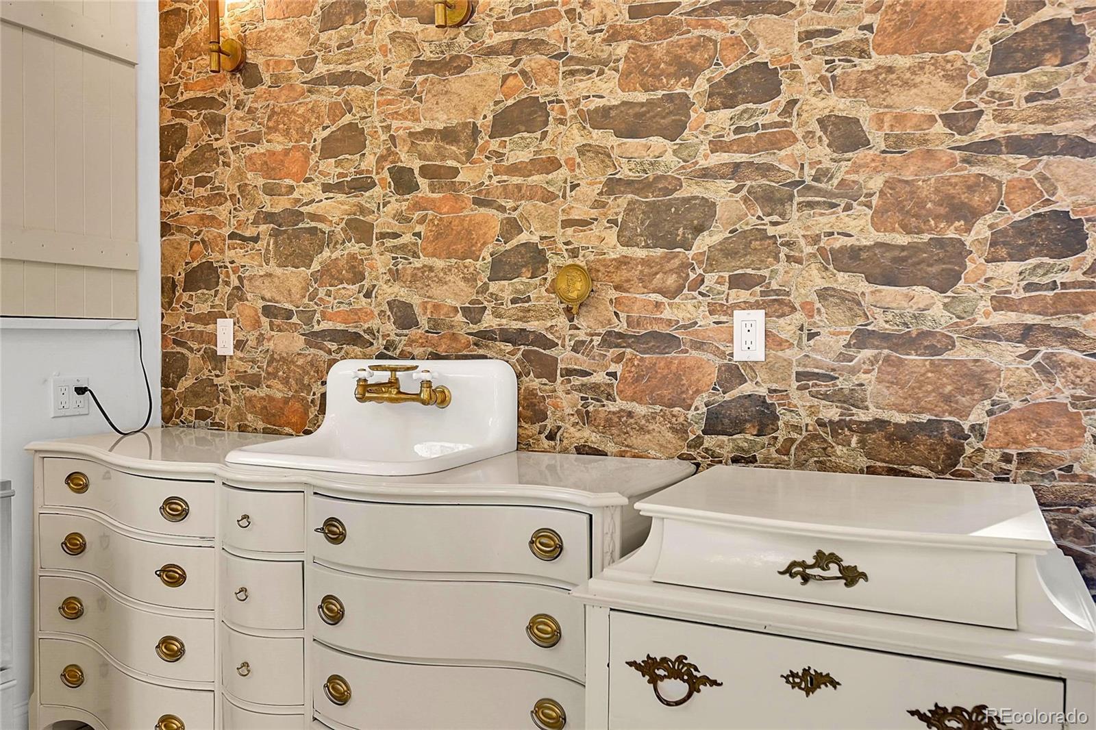 148 Ridge Lane Bailey, CO 80421 - Photo 12 of 25 a close view of sink cabinets and appliances