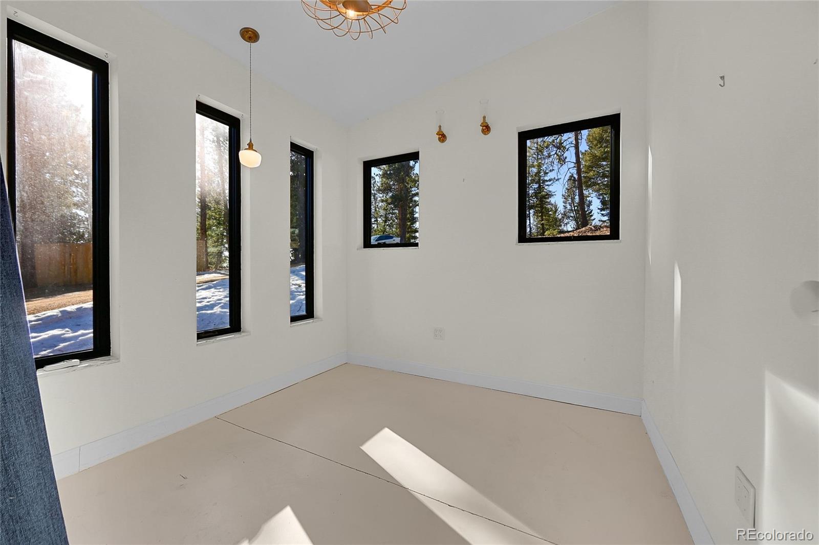 148 Ridge Lane Bailey, CO 80421 - Photo 17 of 25 a view of a hallway with bathroom