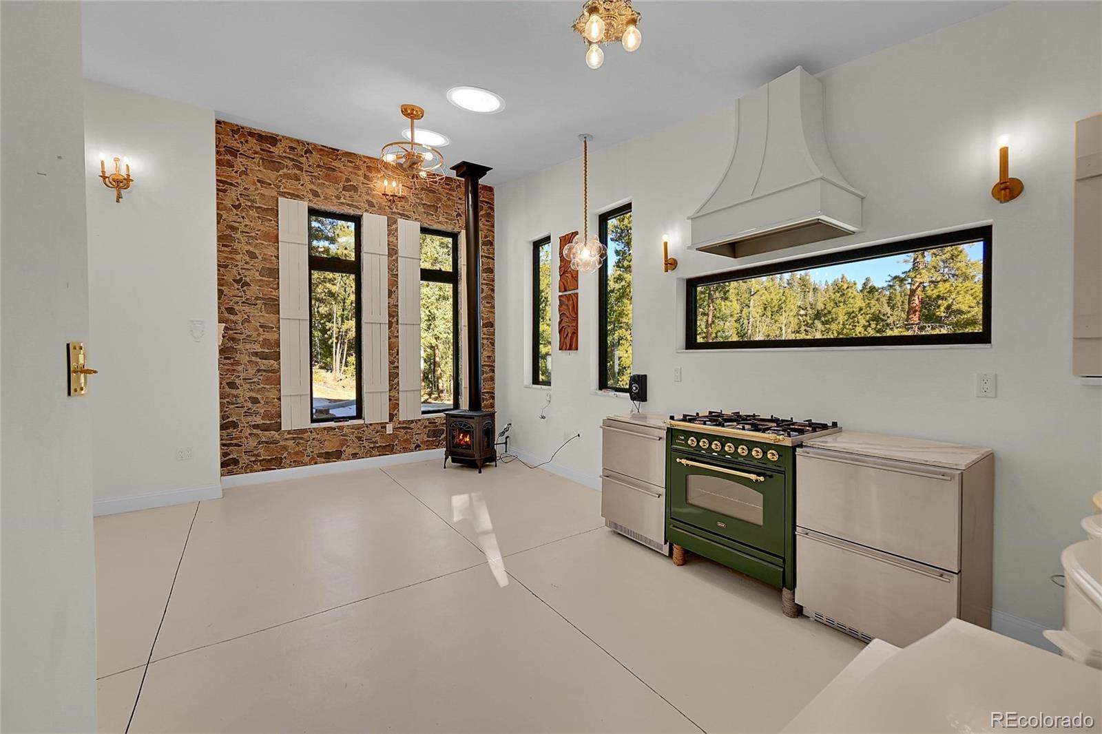 148 Ridge Lane Bailey, CO 80421 - Photo 9 of 25 a view of a livingroom with furniture and windows