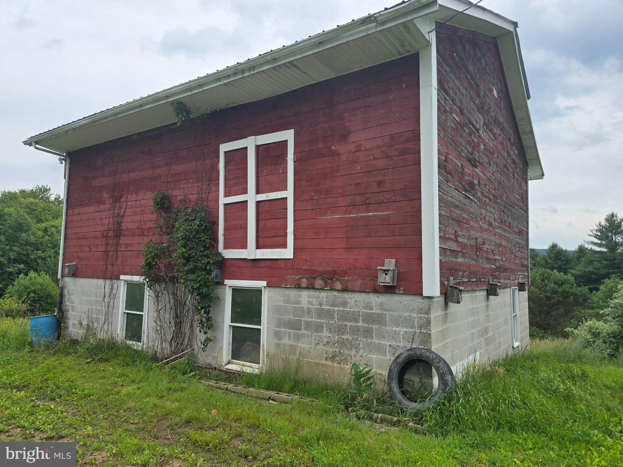 4081 Scootac Road Beech Creek, PA 16822 - Photo 2 of 45 Charming rustic barn with greenery.