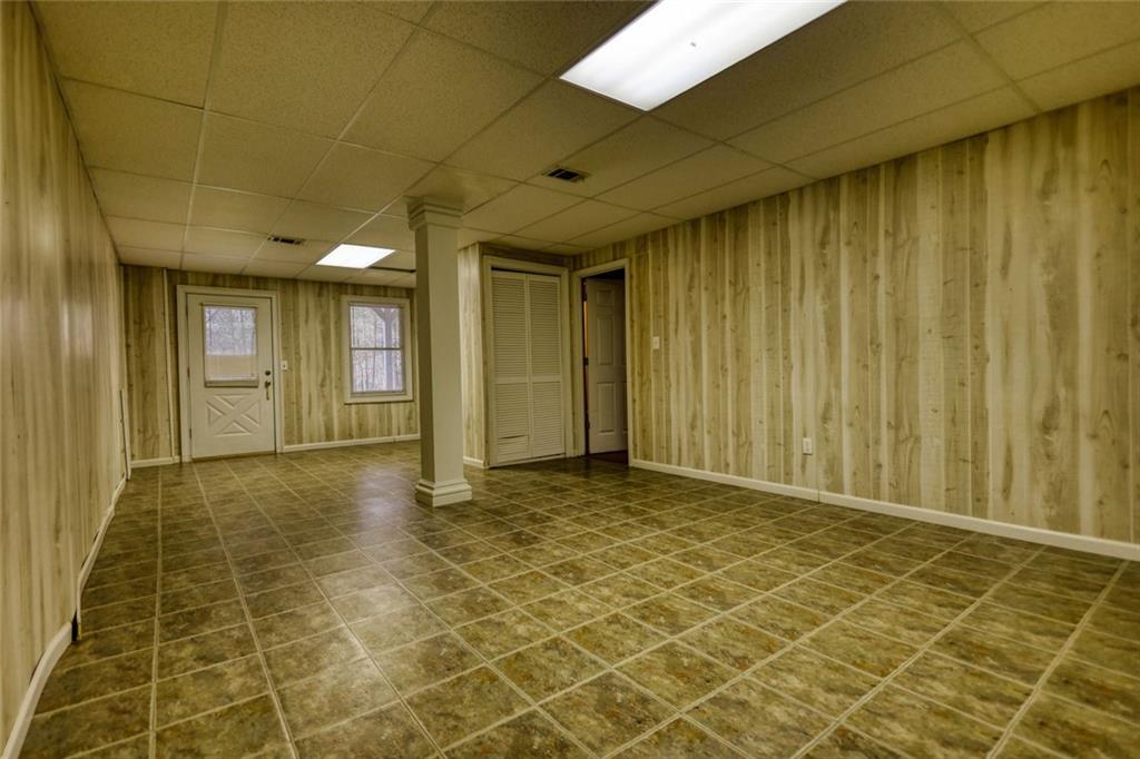 2491 Reids Ferry Road Buckhead, GA 30625 - Photo 8 of 9 a view of a livingroom with wooden floor and a window