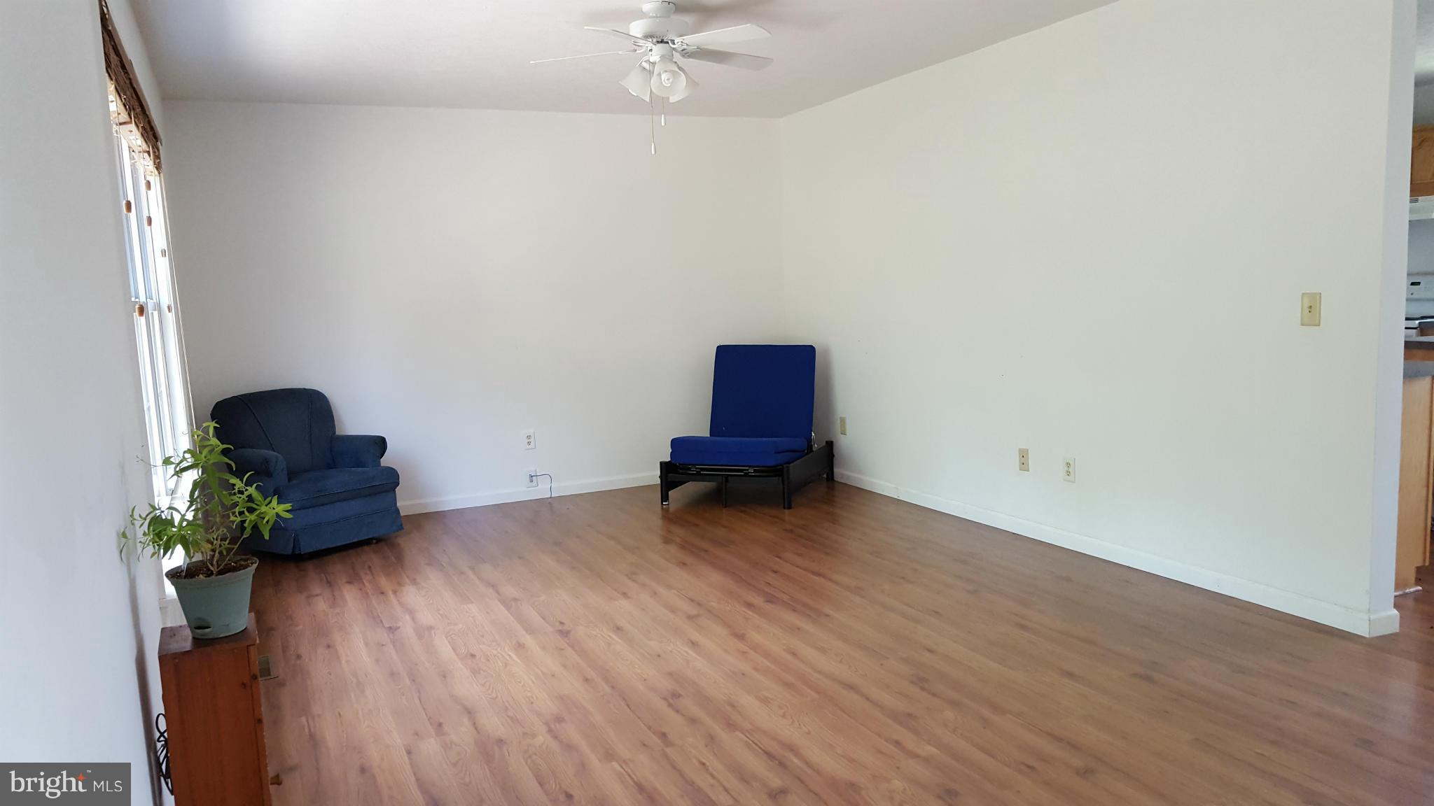 4258 Timber Ridge Road Berkeley Springs, WV 25411 - Photo 8 of 26 a room with furniture and wooden floor