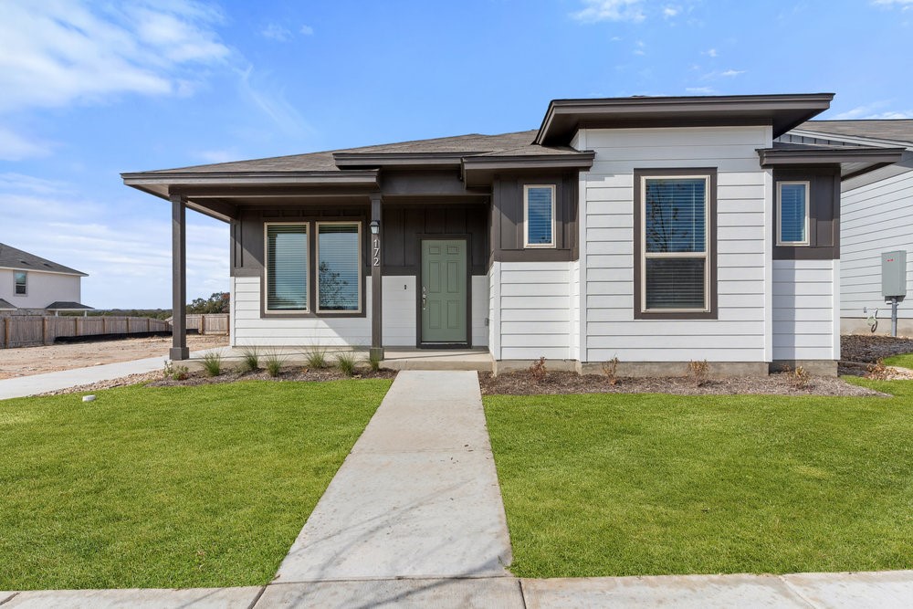 172 Condesa Street Kyle, TX 78640 - Photo 1 of 1 a view of a house with a yard