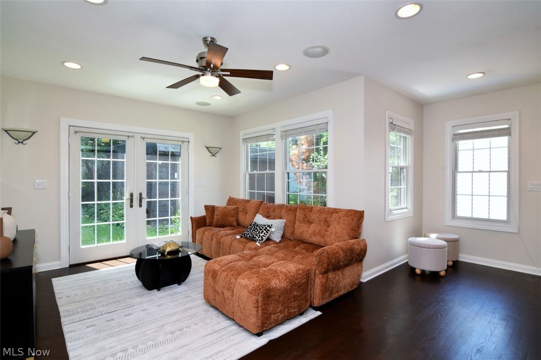 3806 Westwood Road University Heights, OH 44118 - Photo 7 of 41 Living area featuring rich wood-finish flooring, recessed ceiling lighting, a ceiling fan, and white walls