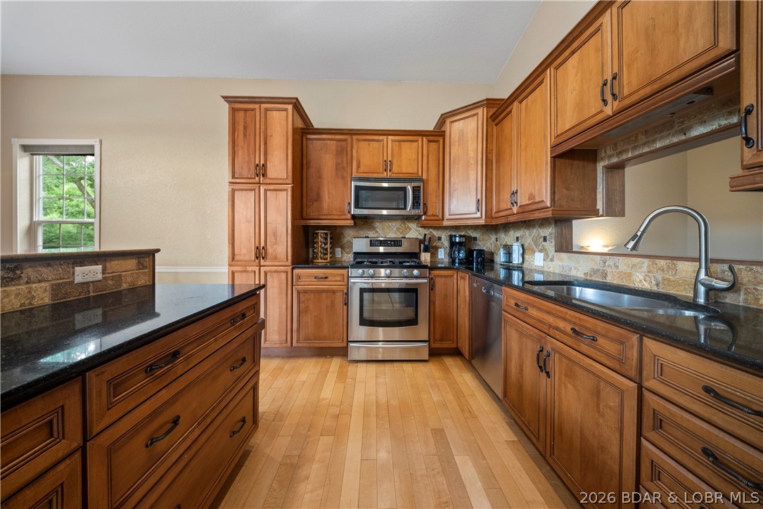 2247 Breezy Acres Road Osage Beach, MO 65065 - Photo 2 of 53 Large open concept kitchen with custom cabinets