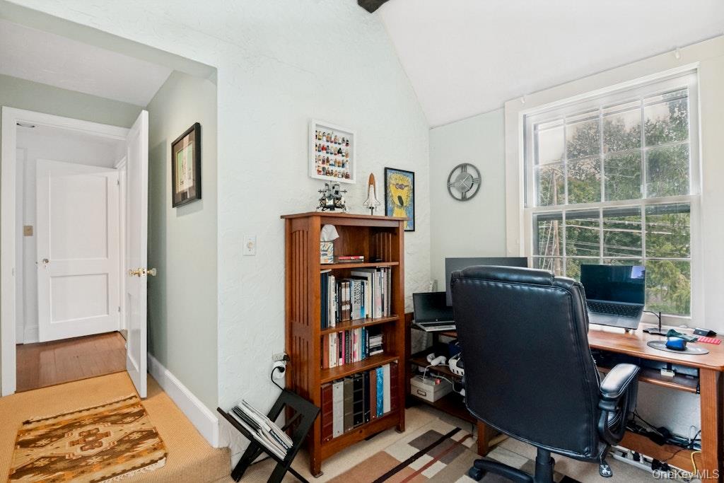 312 Quaker Road Chappaqua, NY 10514 - Photo 29 of 36 a view of a workspace with furniture and a window