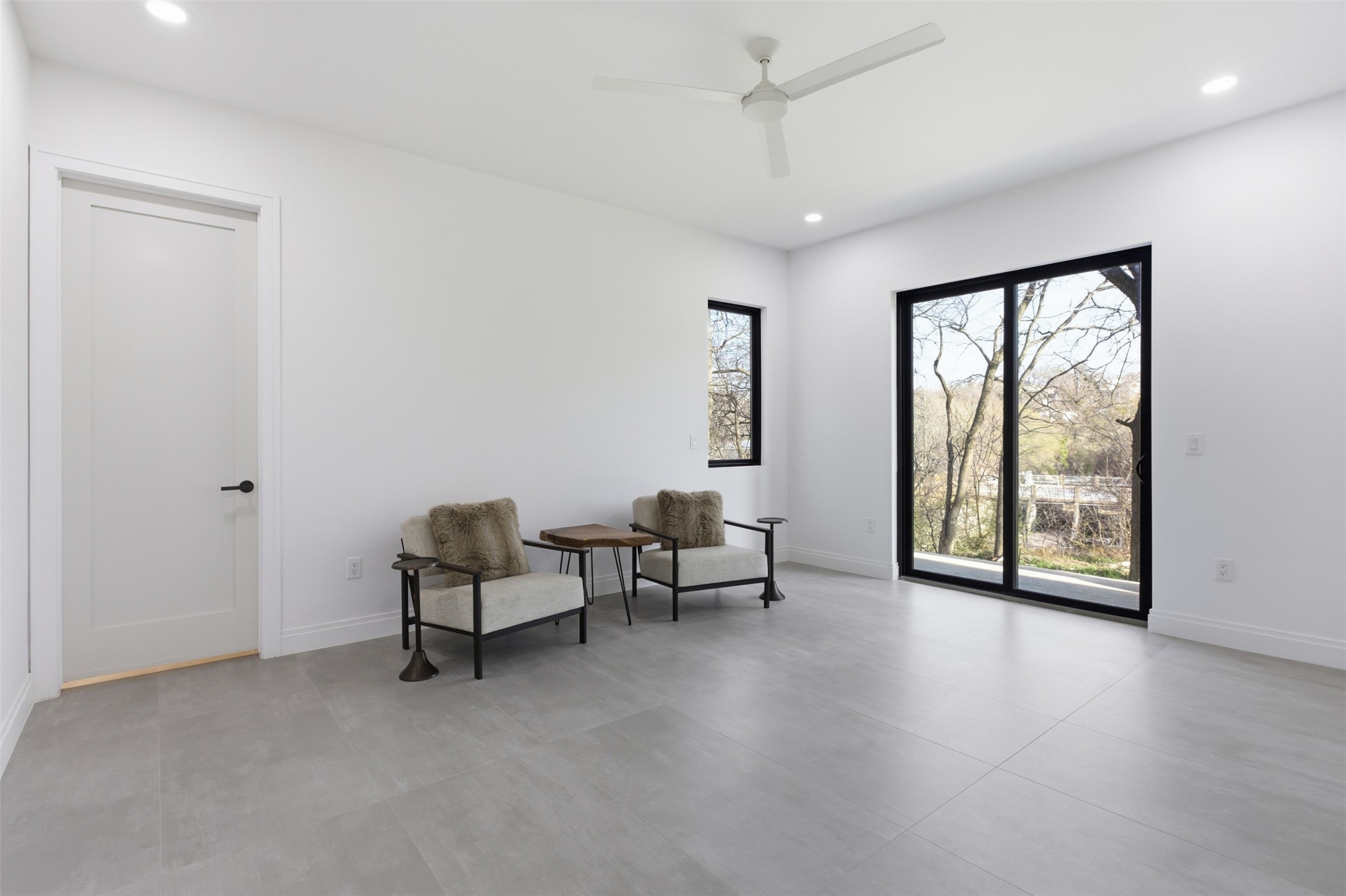 5013 Rob-Scott Street Austin, TX 78721 - Photo 29 of 35 The downstairs ensuite with a private patio.
