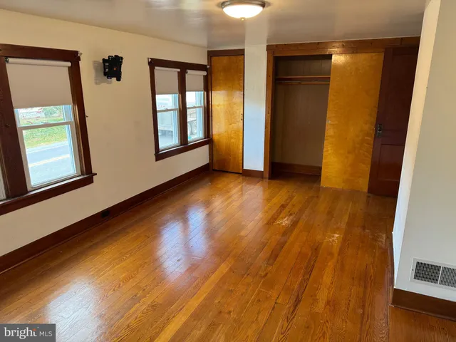 a view of an empty room and window