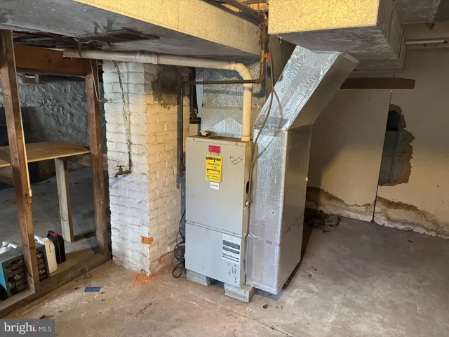 a view of a house with parking space