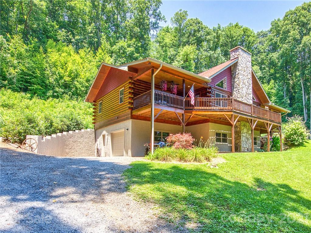 273 Mellow Springs Road Waynesville, NC 28786 - Photo 2 of 40 a view of a house with a yard