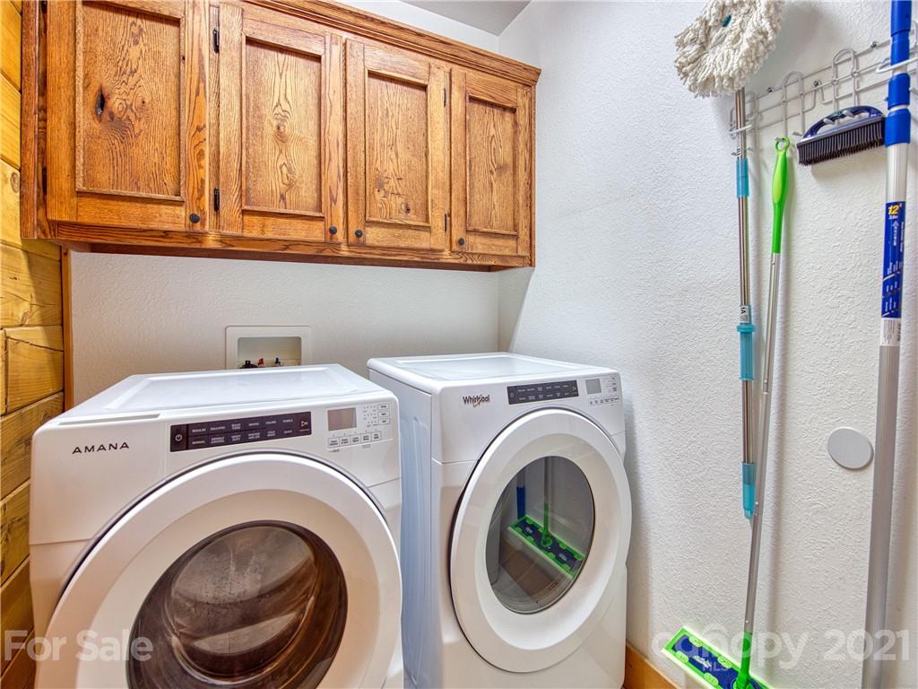 273 Mellow Springs Road Waynesville, NC 28786 - Photo 28 of 40 a utility room with dryer and washer