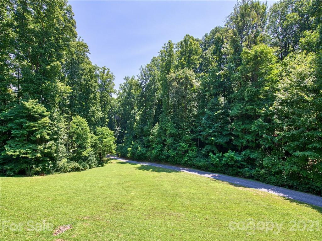 273 Mellow Springs Road Waynesville, NC 28786 - Photo 6 of 40 a view of an outdoor space and a yard