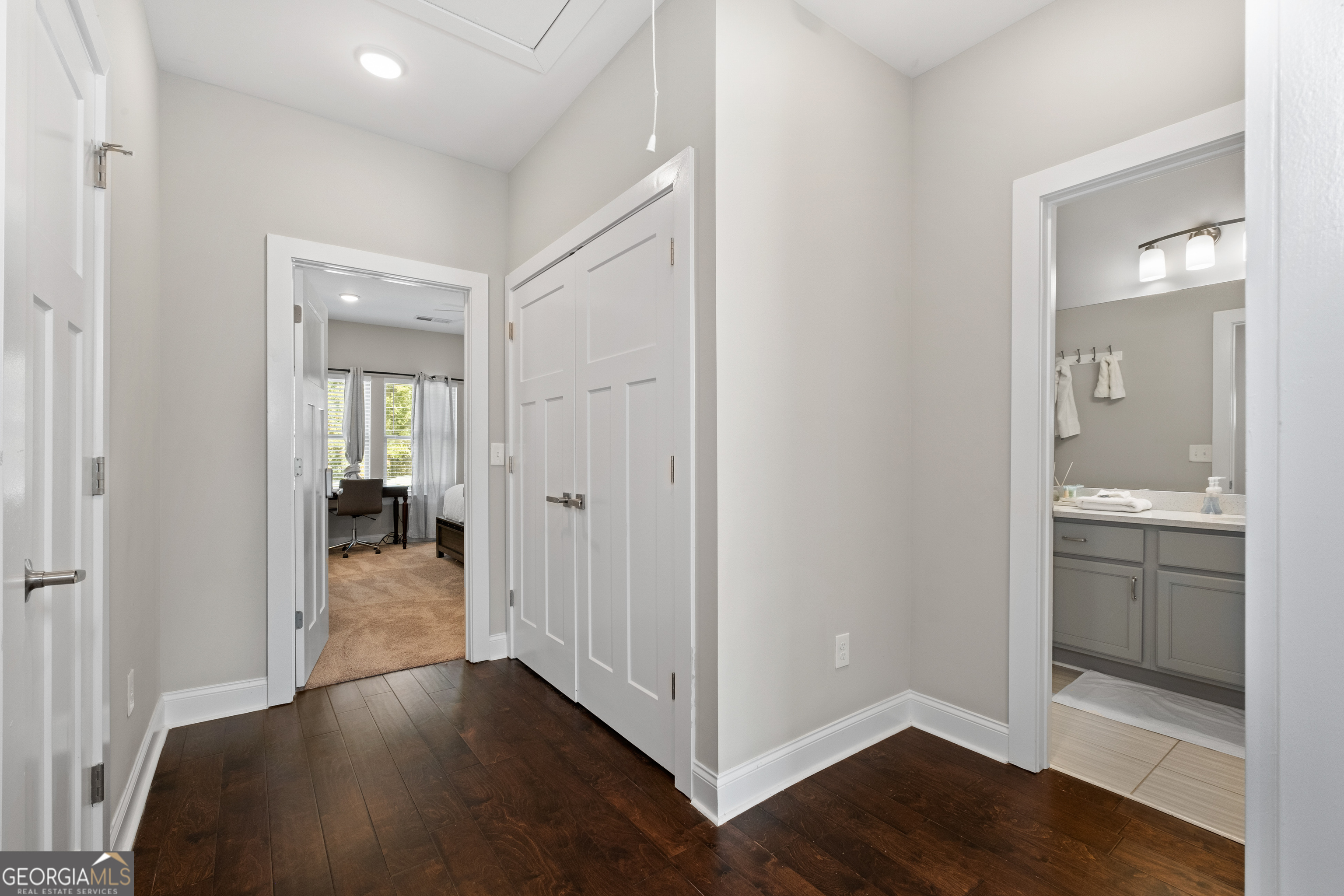 3775 Jack Vernon Circle Powder Springs, GA 30127 - Photo 15 of 33 a view of a room with bathroom and wooden floor