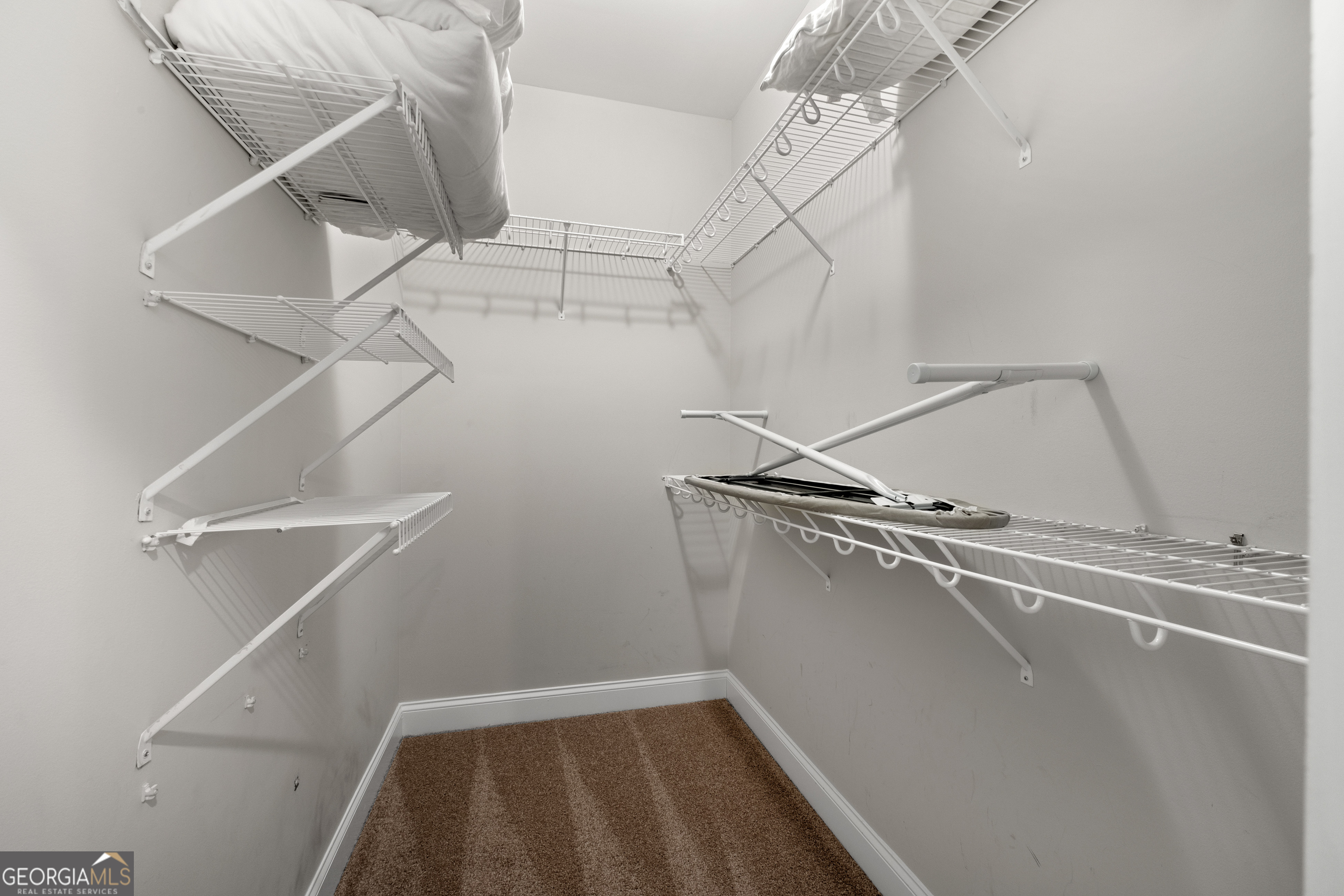 3775 Jack Vernon Circle Powder Springs, GA 30127 - Photo 20 of 33 a view of a room with racks on the wall