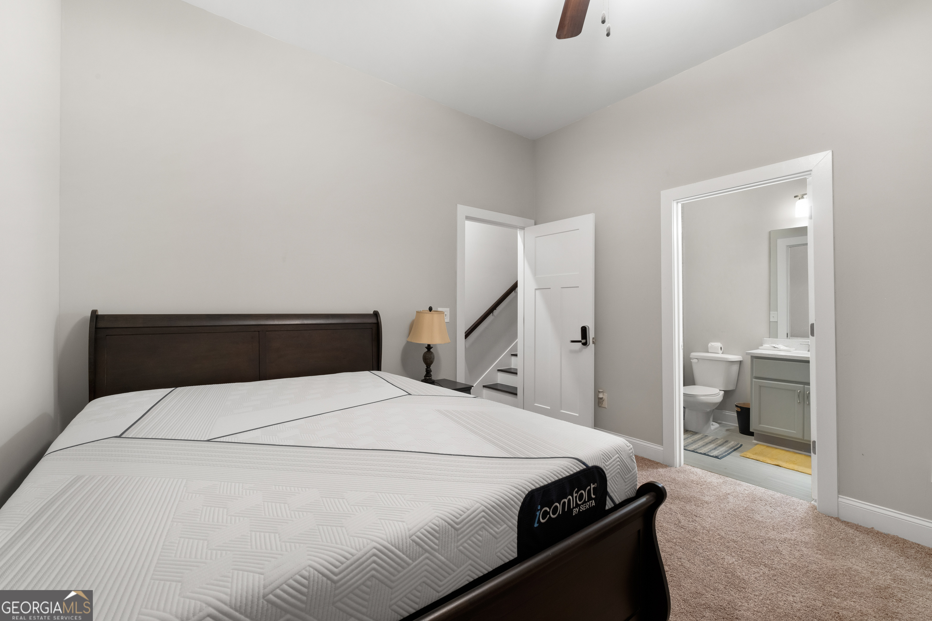 3775 Jack Vernon Circle Powder Springs, GA 30127 - Photo 28 of 33 a bedroom with a bed and a view of living room