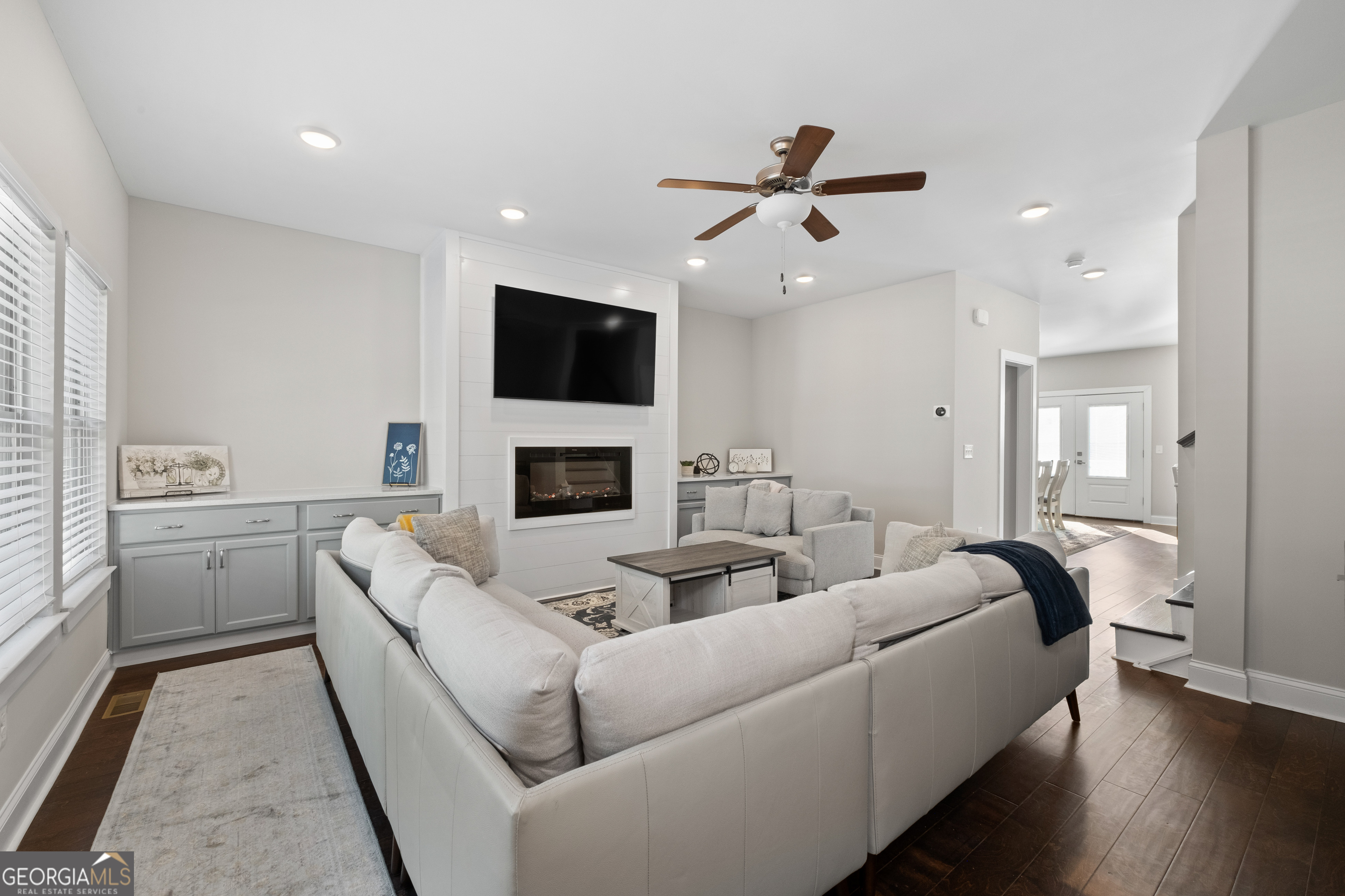 3775 Jack Vernon Circle Powder Springs, GA 30127 - Photo 4 of 33 a living room with furniture and a fireplace