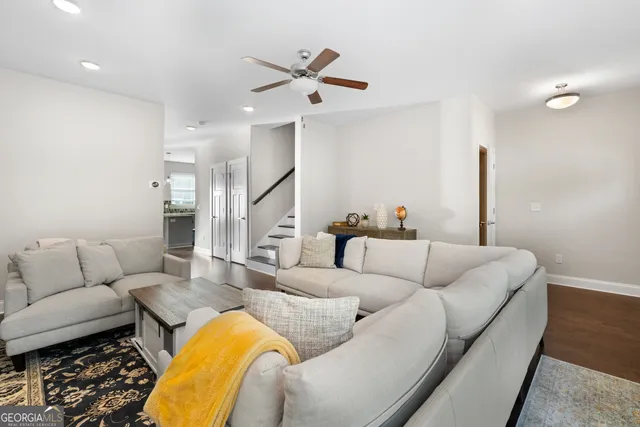 a living room with furniture and a couch