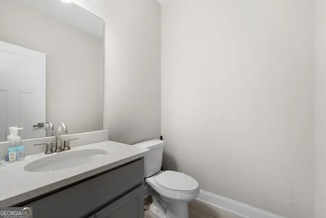 a bathroom with a sink and a toilet